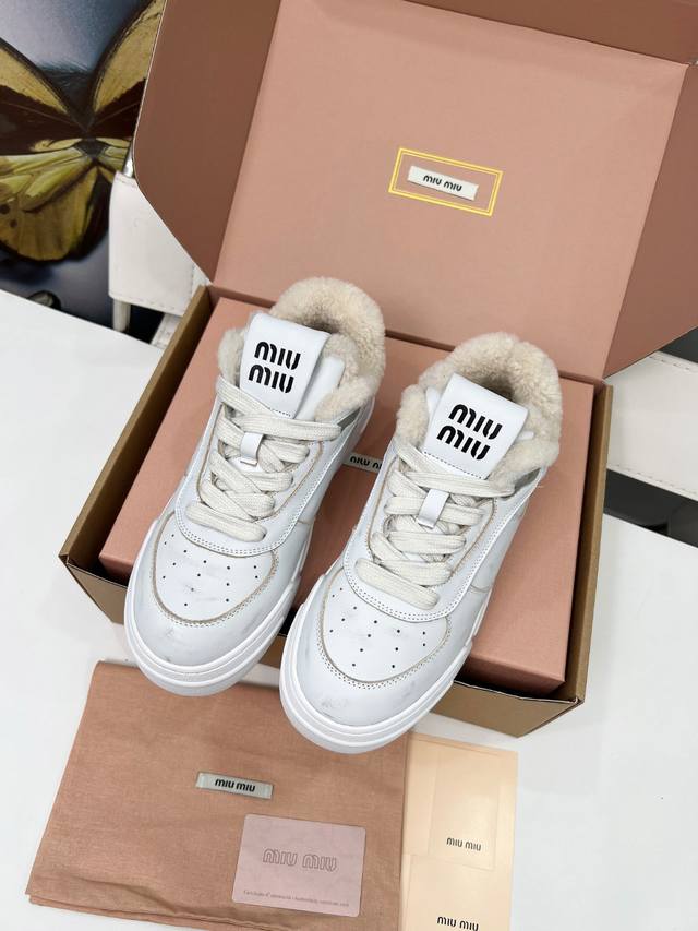 New Miu Miu distressed white sneakers