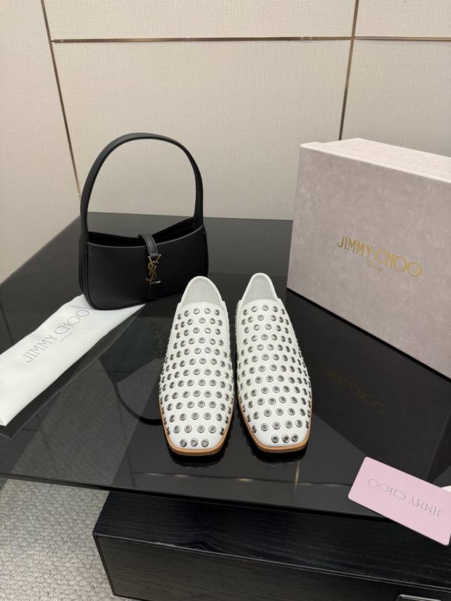 Jimmy Choo loafers, exclusive release. The unique studded design, crafted with t