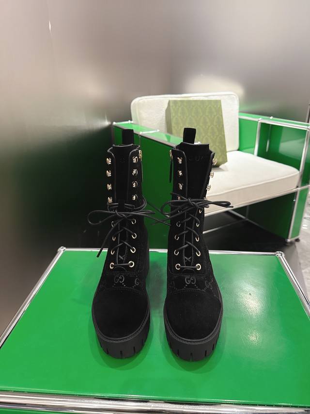 K055 Gucci Women's Gg Lace-up Ankle Boots These lace-up ankle boots are crafted
