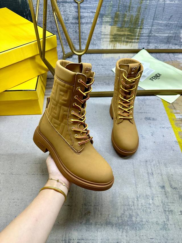 Fendi Filo round-toe lace-up military boots. Light brown waterproof suede upper