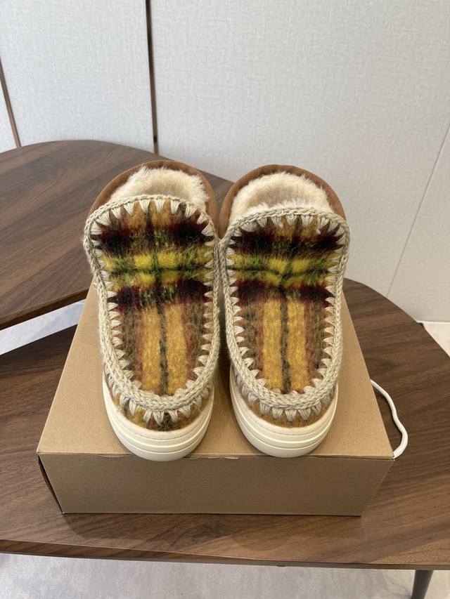 Mou trendy wool snow boots boast a highly recognizable design style, combining n