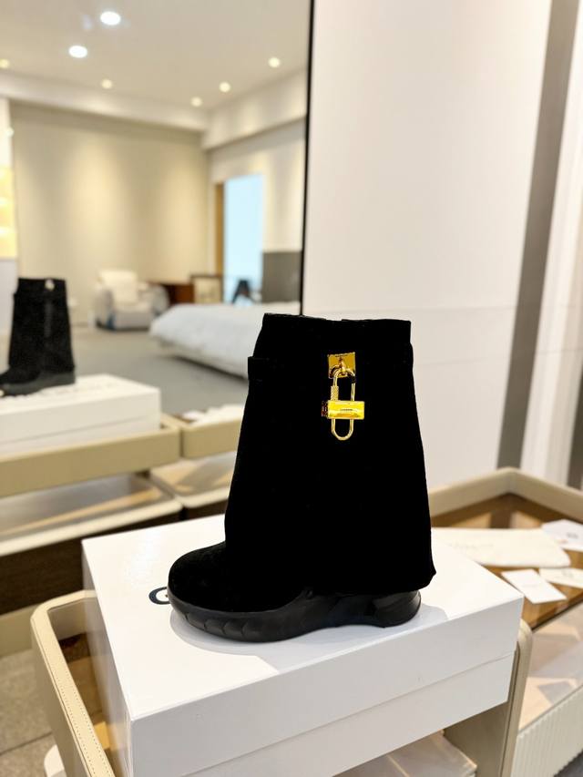 Price: Givenchy Wedge Heel Slimming Shark Boots The most popular leg-length boot