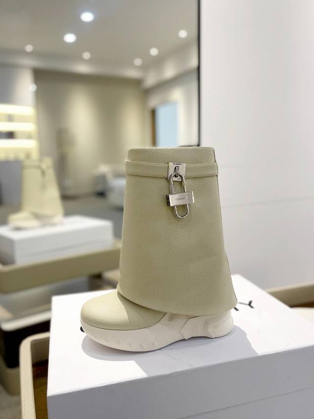 Price: Givenchy Wedge Heel Slimming Shark Boots The most popular leg-length boot