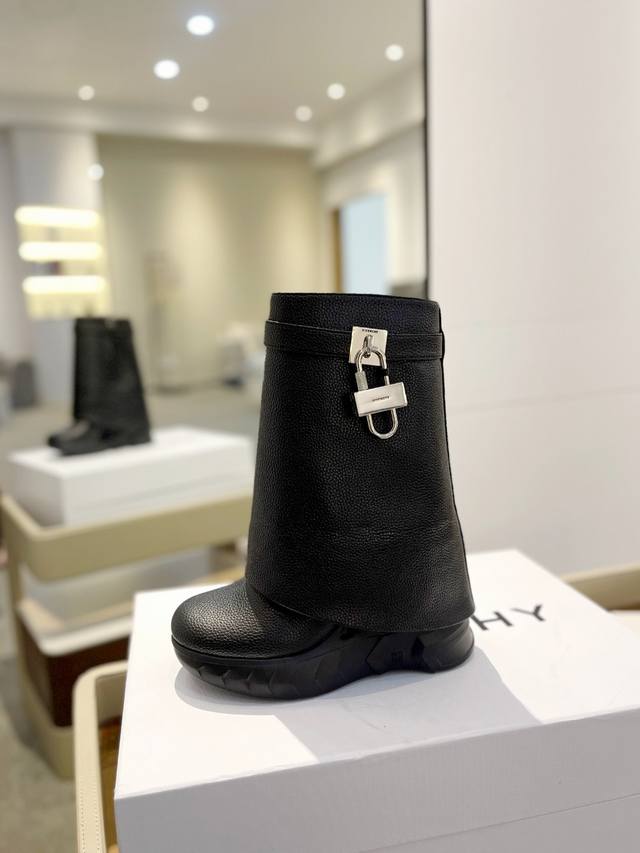 Price: Givenchy Wedge Heel Slimming Shark Boots The most popular leg-length boot