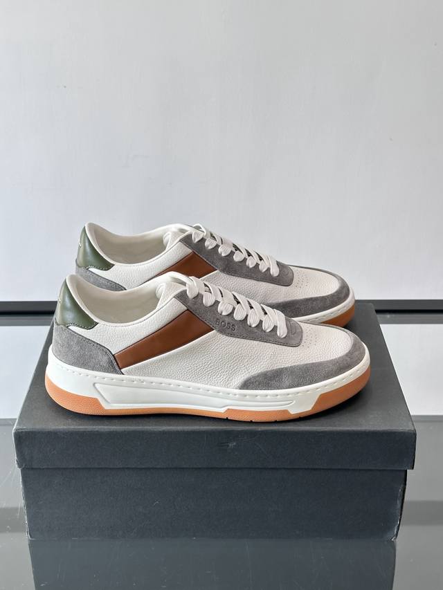 Boss casual sneakers, made with genuine leather and suede, offering a delicate t