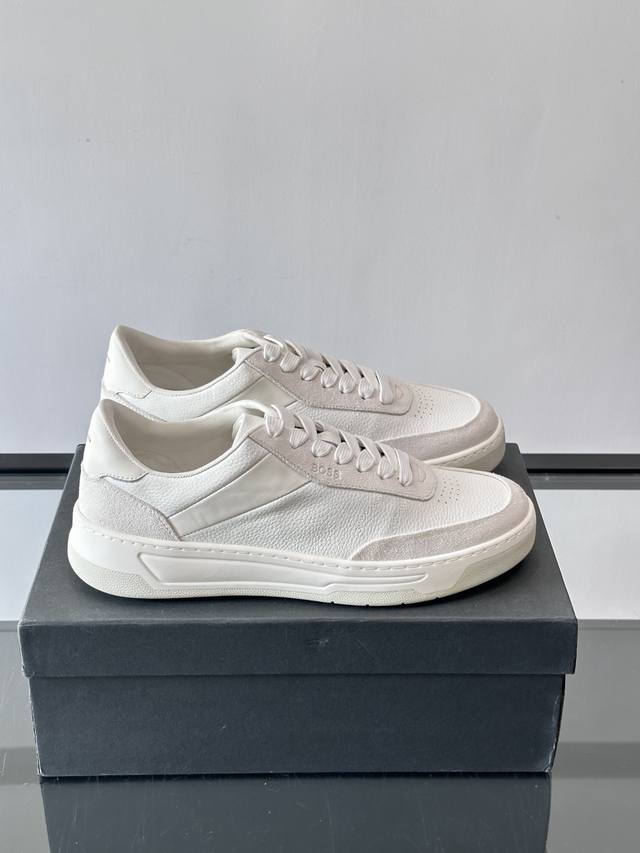 Boss casual sneakers, made with genuine leather and suede, offering a delicate t