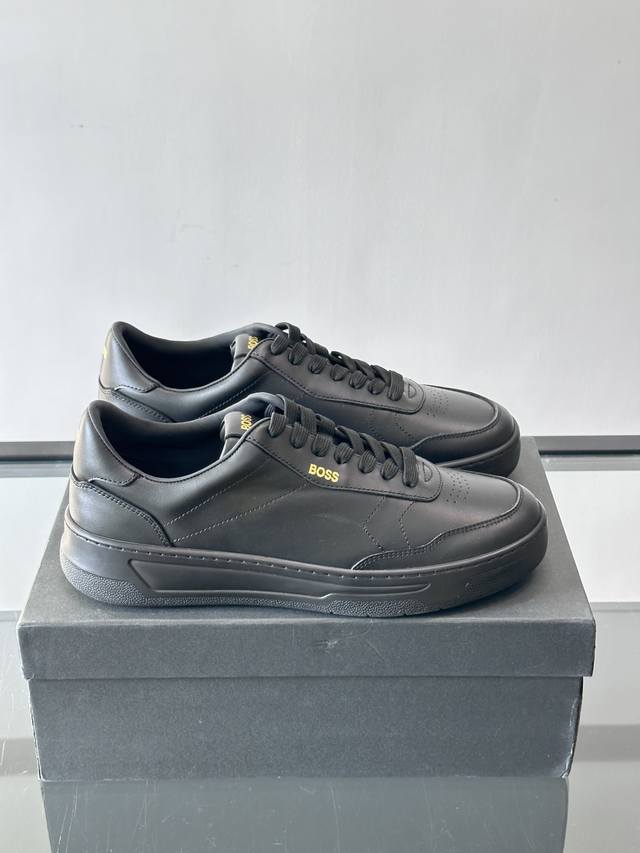 Boss casual sneakers, made with genuine leather and suede, offering a delicate t