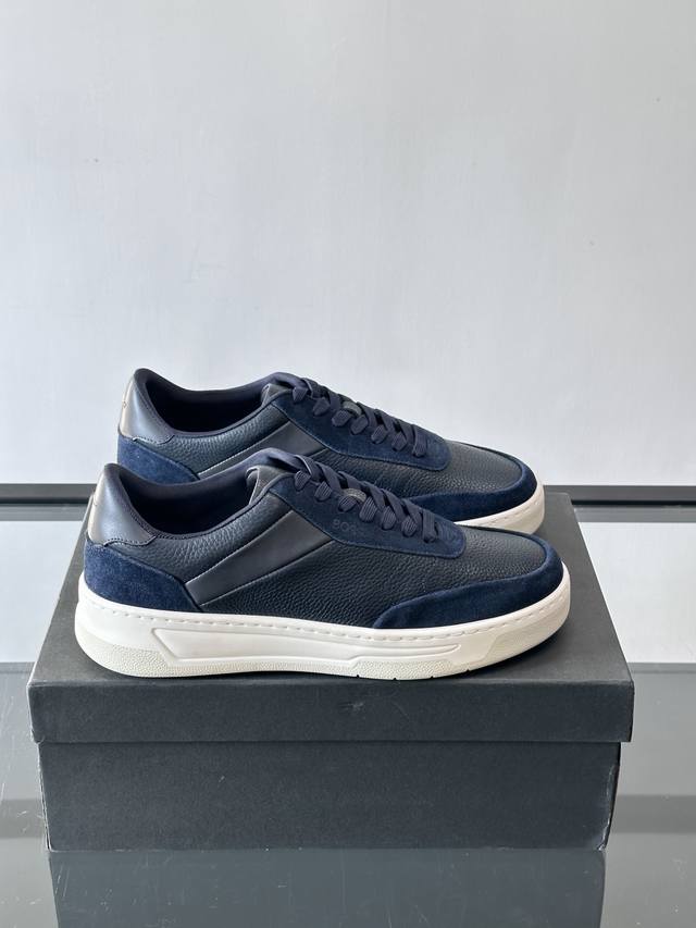 Boss casual sneakers, made with genuine leather and suede, offering a delicate t