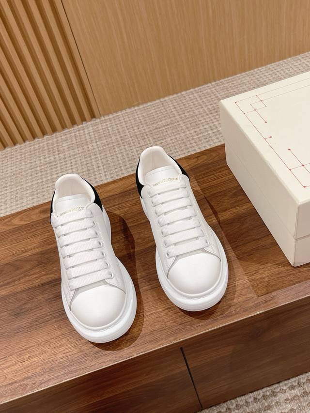 McQueen classic versatile white sneakers. Features include: stain and wrinkle r