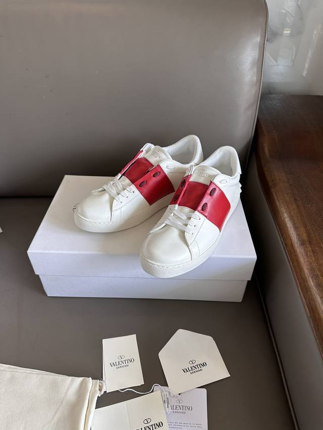 Valentin* Valentin's popular low-top calfskin sneakers. Made of calfskin leather