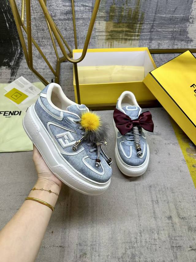 Real Price: Fendi Match lace-up sneakers. Light blue denim-effect printed materi