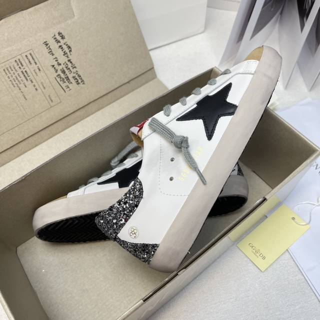 Men's +10 . This is a custom colorway of the Golden Gse Deluxe Brand Super Tar