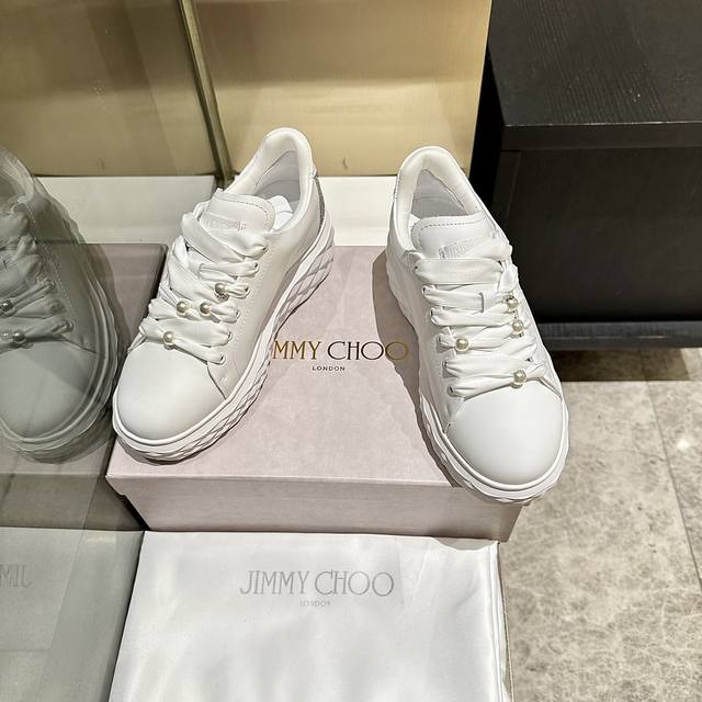 New Jimmy Choo sneakers, exclusively released. Original design with a classic w