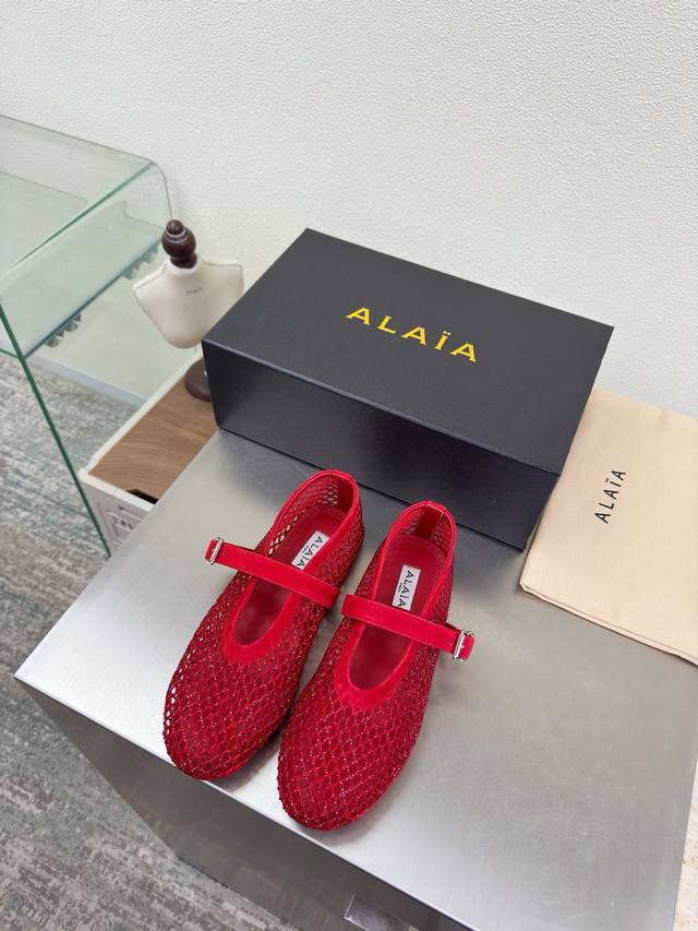 Exquisite diamond-encrusted Alaia slippers from Paris. A stunning red color, ha
