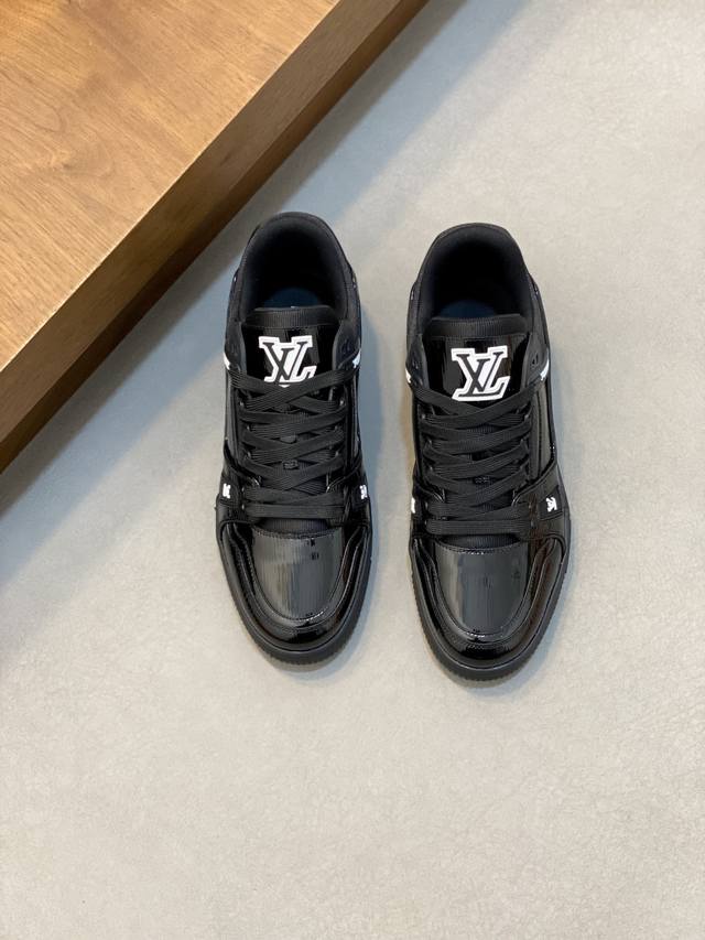 LV Vuitton Men's New Trainer Series Sneakers This LV Trainer sneaker features Mo