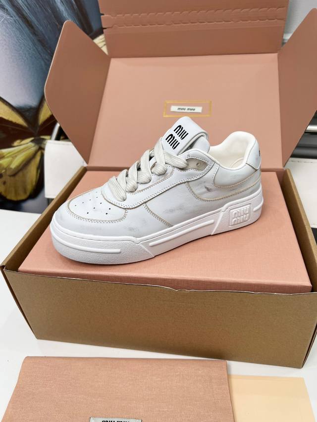 New Miu Miu distressed white sneakers