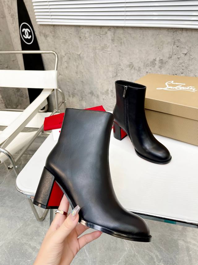: Christian Louboutin Cl's new chunky-heeled platform boots, crafted from glossy