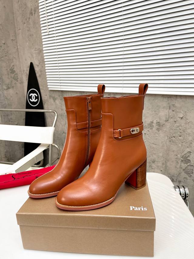 : Christian Louboutin Cl's new chunky-heeled platform boots, crafted from glossy