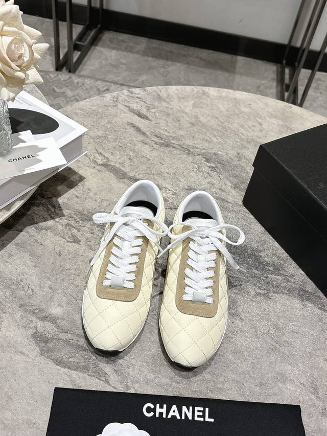 Chanel quilted baseball/tennis shoes, black and white panda colorway casual snea