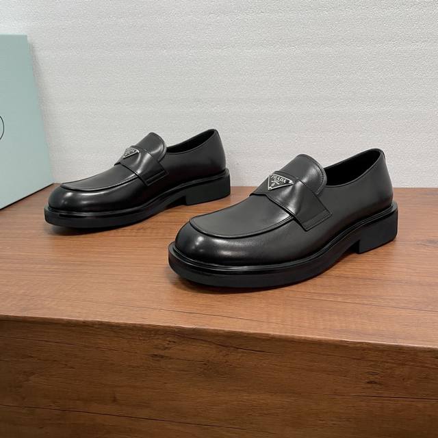 Prada Men's New Leather Loafers ( ) These loafers exude elegance and modern sty