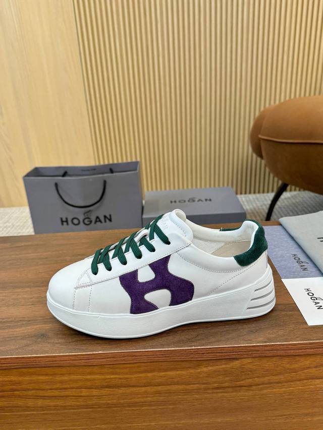 Hogan classic sneakers blend elegance and modernity, featuring a rich color pale