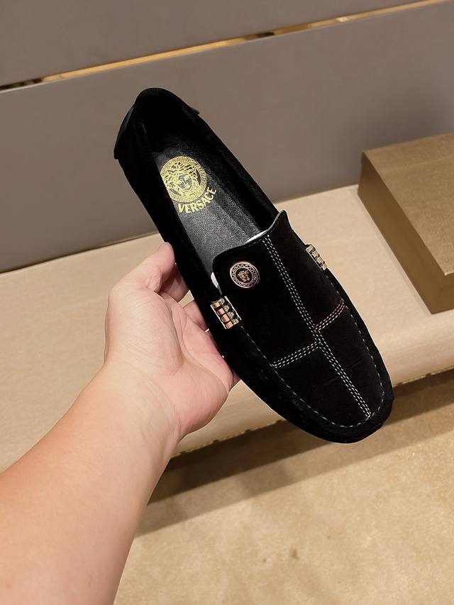 Versace brand, leather lining, upper made of top-grain suede leather with an em