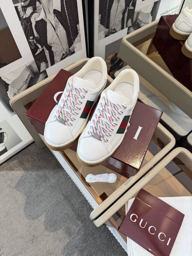 Gucci's new men's shoes feature classic webbing elements in a black and white c