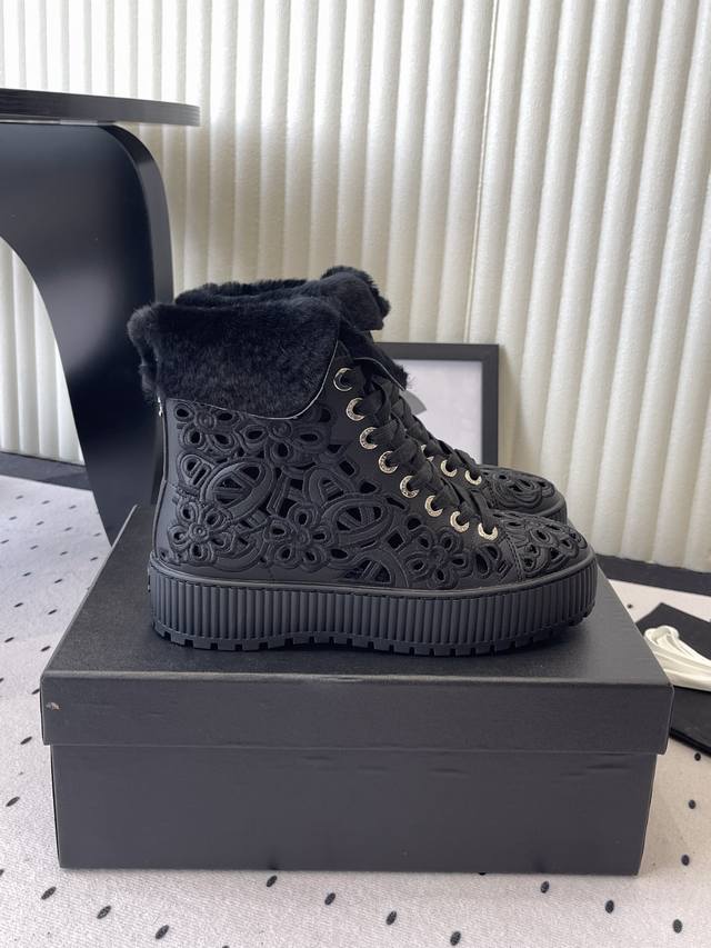 Chanel Fall/Winter New Perforated Ankle Boots. The upper features classic brogue