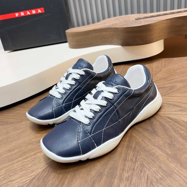 Prada New Men's Patchwork Casual Sneakers These sneakers feature exquisite stit