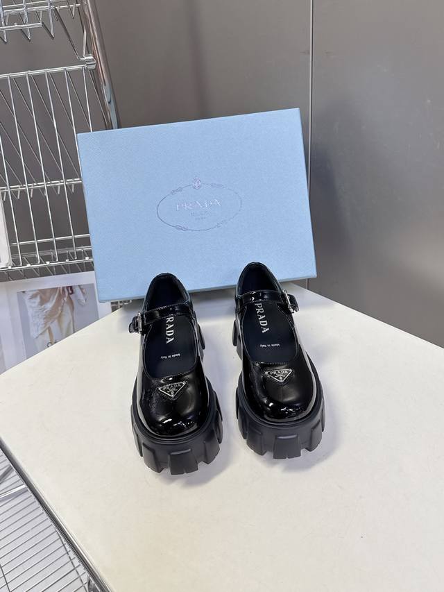 Prada's latest triangular logo platform Mary Jane loafers. Recommended by numer