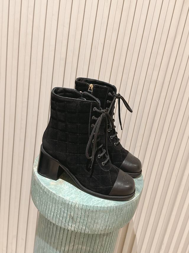 Top-tier version: Chanel 26C quilted color-blocked chunky heel combat boots. The