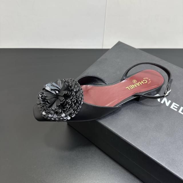 EntertainmentThese Chanel floral flat closed-toe sandals are absolutely stunning
