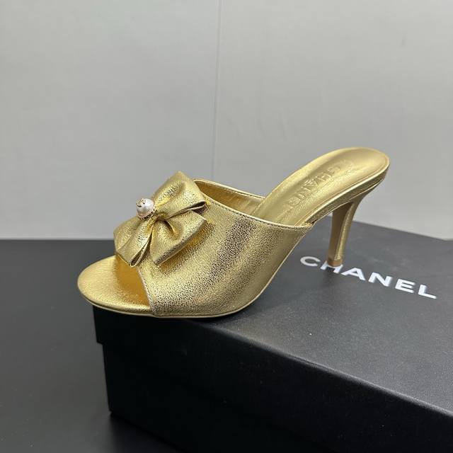 Chanel 26C Double Bow Double C Flat High-Heeled Mules. The double bow design at