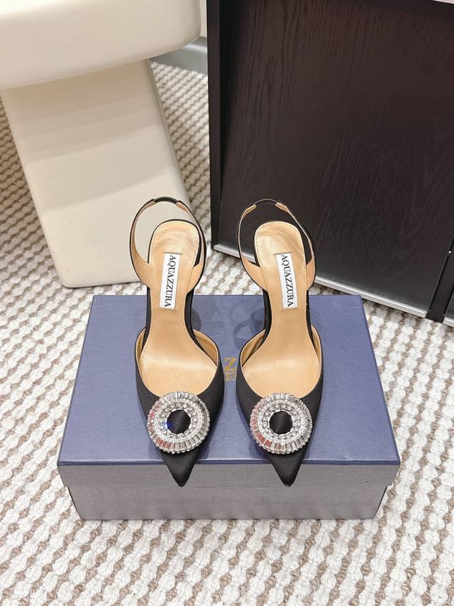 Retailer-grade Aquazzura high-heeled sandals with rhinestone buckles from the It