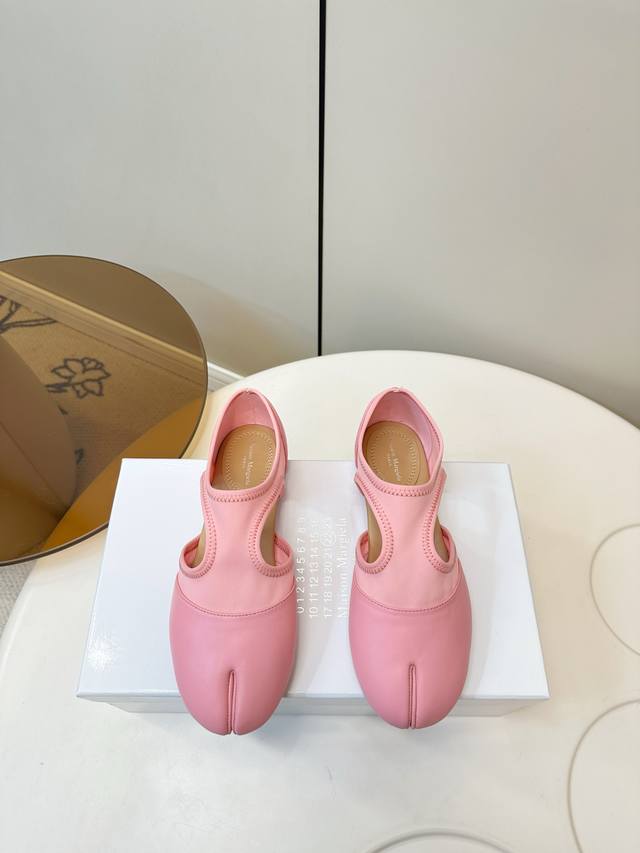 Maison Margiela Tabi Double-Strap Mary Jane Shoes Maison Margiela's classic Tabi