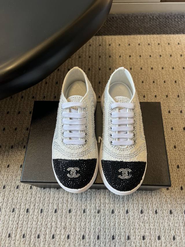 Chane* Platform Rhinestone Color-Blocked Lace-Up Sneakers The upper features a l