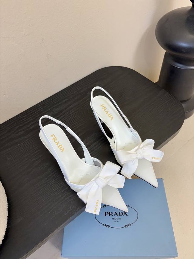prad*25Ss Retro Triangle Logo Pointed Toe Kitten Heel The Prada triangle logo is