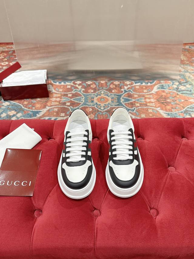 Female p Male p Gucci * Platform Couple Sneakers These sneakers feature a platfo