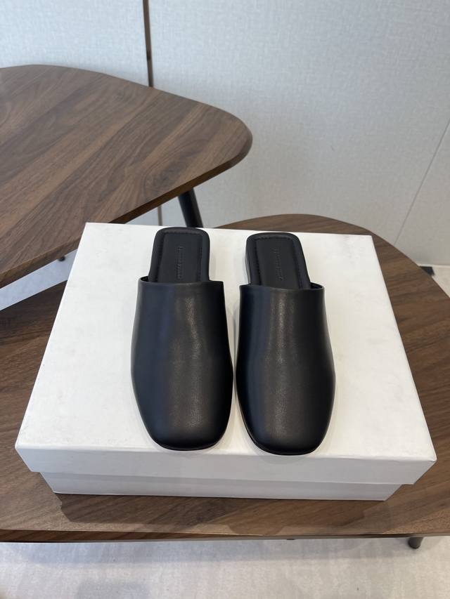 Phoebe Philo Low-Heeled Mule Slip-Ons These mule slip-on shoes feature a backles